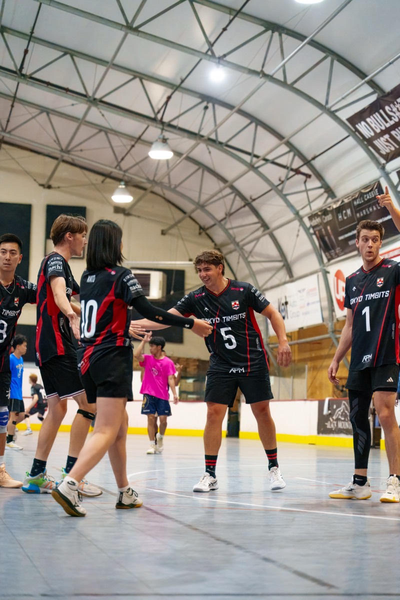 Blockers challenging a spike at the net